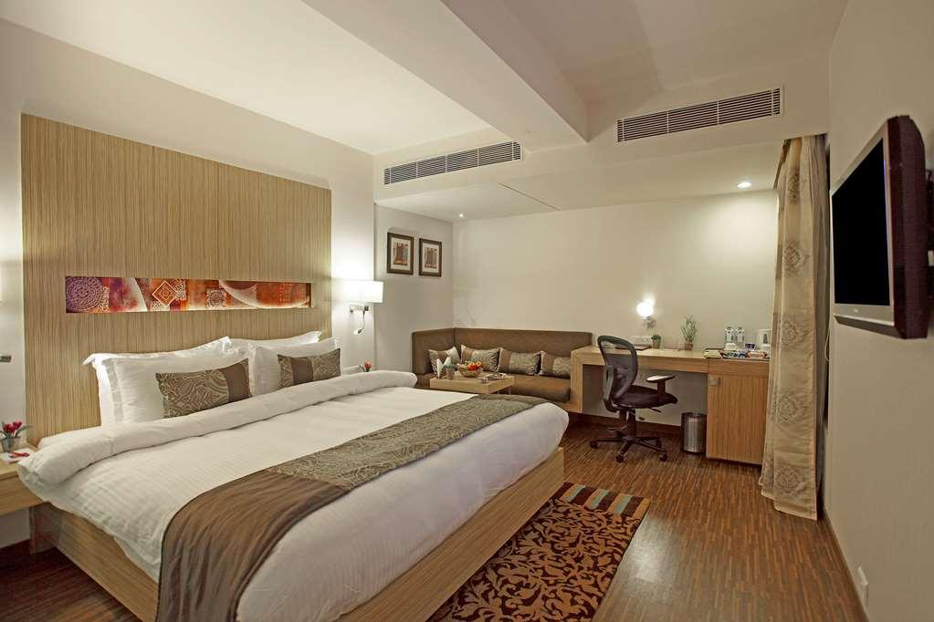 Comfort Inn Legacy Rajkot Rom bilde